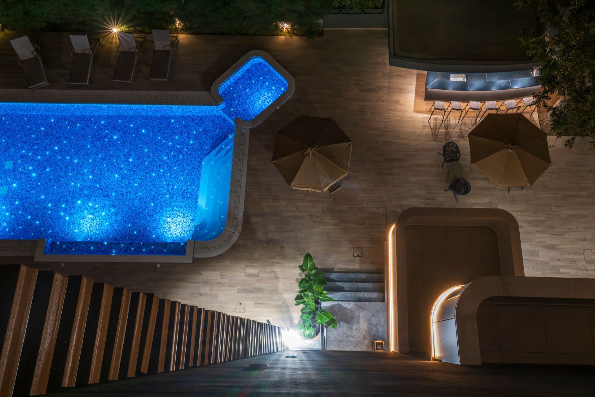 Pool and building at night